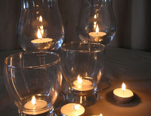 Club Candles, Votives & Wine Glasses of Different Heights for Festive Warmth and Glow